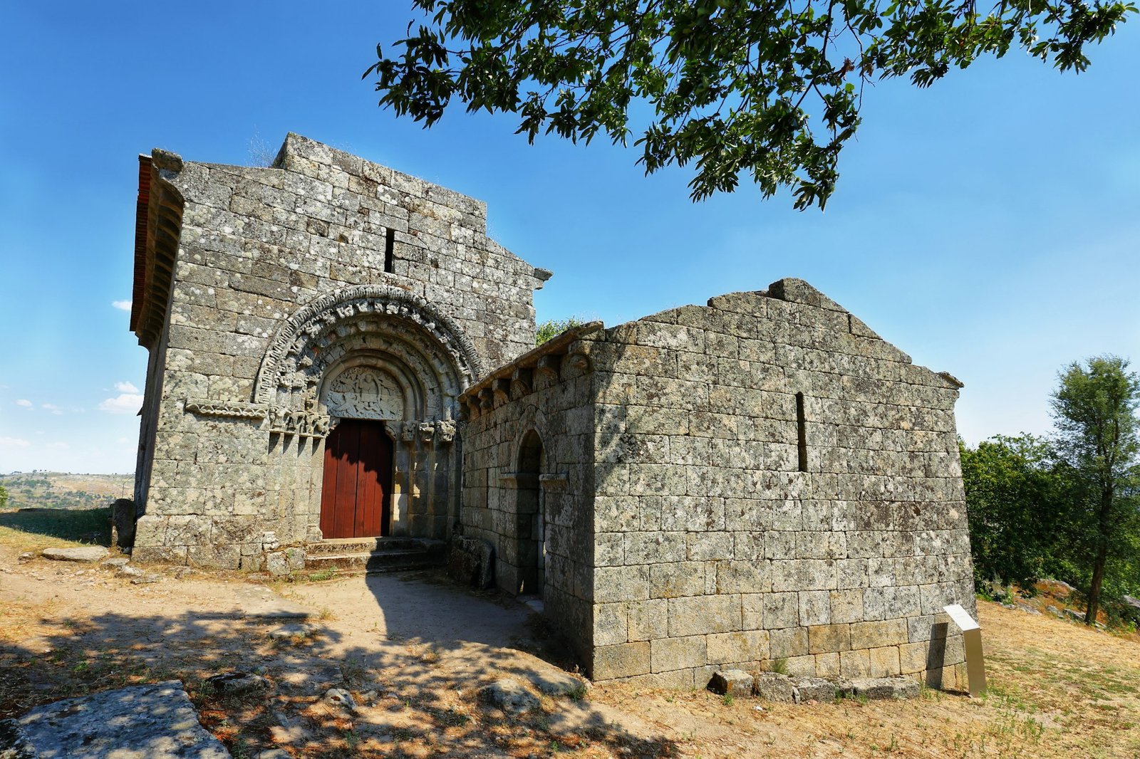 Views of San Salvador church in medieval walled village near Carrazeda de Ansiaes, Portugal
